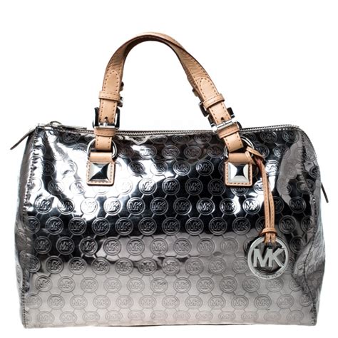 buy michael kors metallic silver purse discount|michael kors small wristlet.